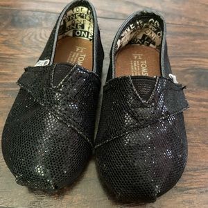 TOMS: sparkly black. Baby size 4